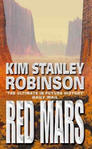 Cover of the HarperVoyager paperback edition of Red Mars by Kim Stanley Robinson, showing weathered orange canyon formations under a hazy Martian sky with the author's name in silver embossed type.